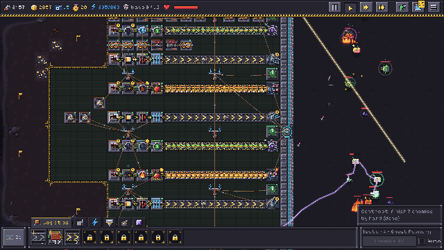 A late-game factory with long lines of machines and a laser beam crossing the field.