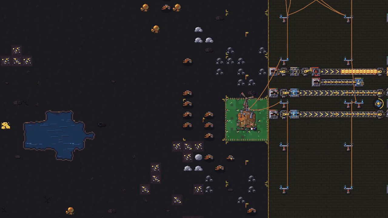 A blue water basin beside the factory and Odette’s house in a later biome.