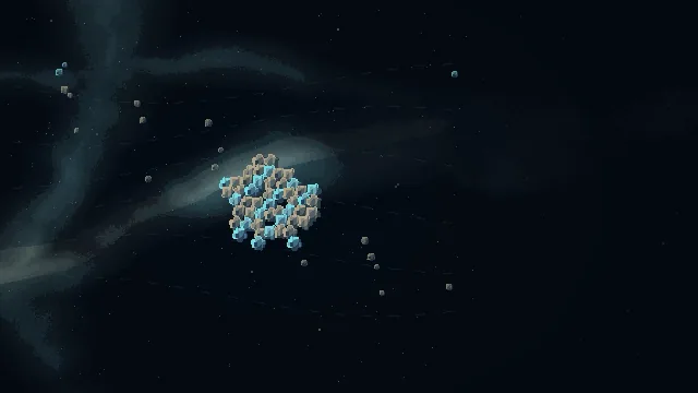 A cluster of small blue and grey grains stuck together.